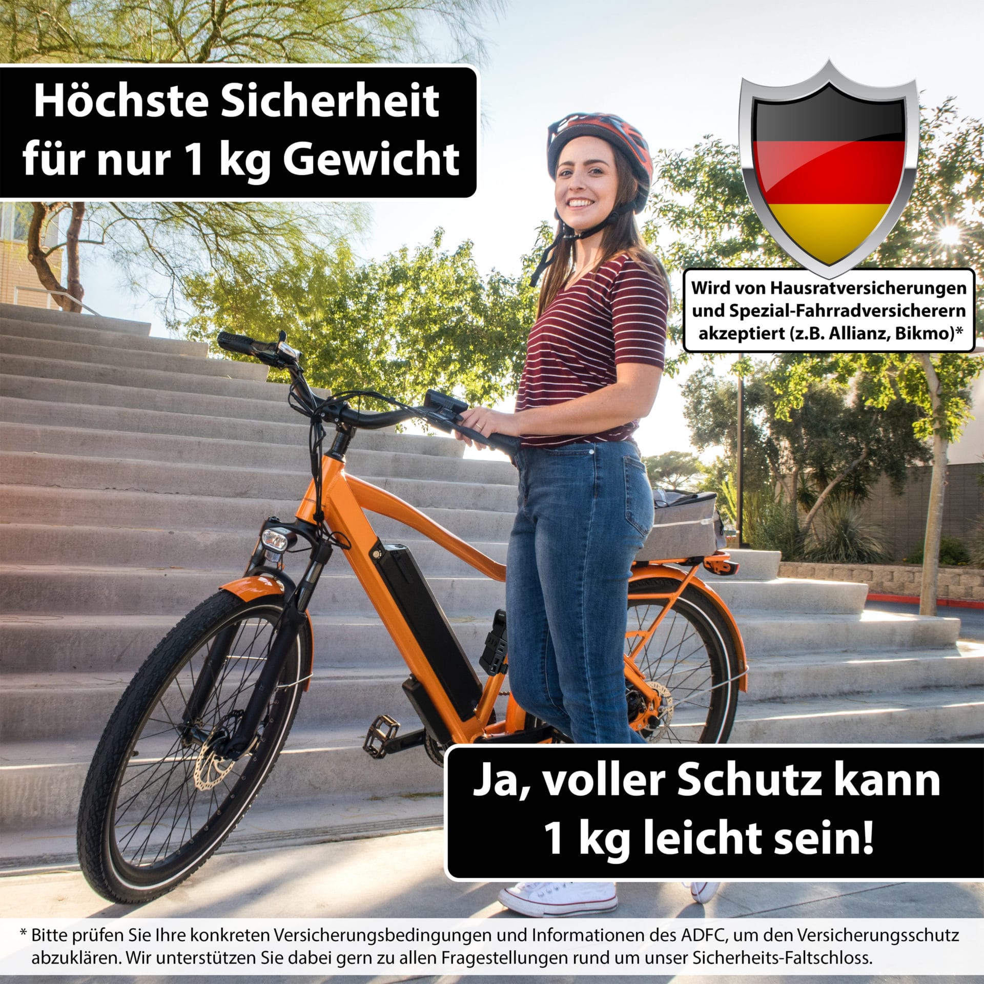 Eine Frau mit Helm steht mit einem orangefarbenen E-Bike; der Text wirbt für das Premium Sicherheits-Faltschloss "Wien" - ein leichtes, sicheres Fahrradschloss, das von den Versicherern akzeptiert wird.