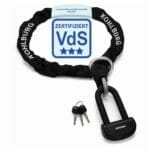 Das massive Sicherheits-Motorradschloss "Alcatraz" von KOHLBURG, VdS-zertifiziert, ist mit drei Schlüsseln an einem Schlüsselbund daneben abgebildet.