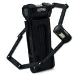 Ein teilweise aufgeklapptes schwarzes Langes Premium Zahlen-Faltschloss "Florenz" mit einem Kombinationsmechanismus.