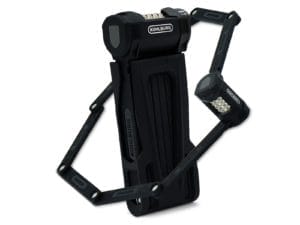 Ein teilweise aufgeklapptes schwarzes Langes Premium Zahlen-Faltschloss "Florenz" mit einem Kombinationsmechanismus.