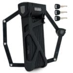 Das Langes Premium Schlüssel-Faltschloss "Rom" ist ein faltbares schwarzes Fahrradschloss, hier mit drei silbernen Schlüsseln auf der rechten Seite.