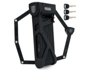 Das Langes Premium Schlüssel-Faltschloss "Rom" ist ein faltbares schwarzes Fahrradschloss, hier mit drei silbernen Schlüsseln auf der rechten Seite.