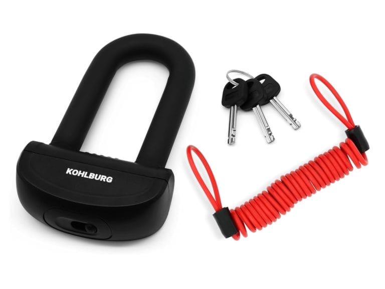 Das Sichere Motorradschloss "Prag" ist ein schwarzes KOHLBURG Bügelschloss mit drei Schlüsseln und einem roten Spiralkabel-Sicherheitsbügel, abgebildet auf weißem Grund.