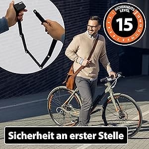 Mann schiebt Fahrrad mit Catania Sicherheits-Faltschloss, Text: "Sicherheit an erster Stelle".